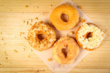Donuts on wooden background