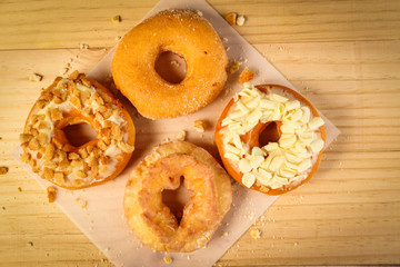 Donuts on wooden background