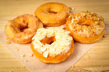 Donuts on wooden background