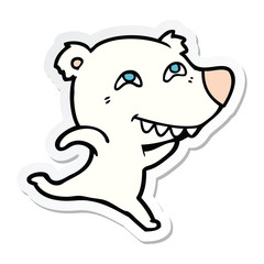 sticker of a cartoon polar bear showing teeth