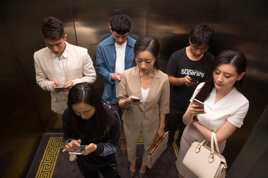 Young men and women of the elevator