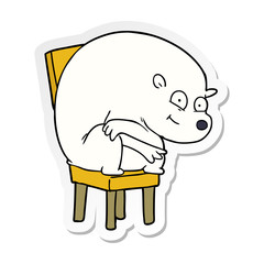 distressed sticker of a happy polar bear on chair
