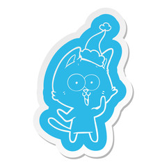 funny cartoon  sticker of a cat wearing santa hat