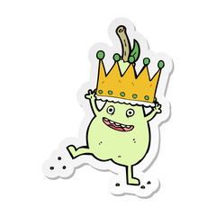 sticker of a caroon pear wearing crown
