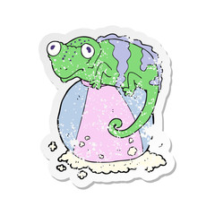 retro distressed sticker of a cartoon chameleon on ball