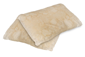 Dirty old pillow from saliva stain isolated on white background.