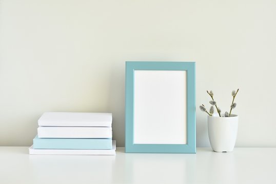Minimal interior, blue photo frame mock up on white table, styled stock photo.