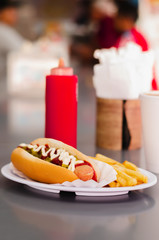 hot dog with potatoes and smoothie