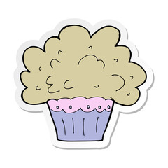 sticker of a cartoon big cupcake