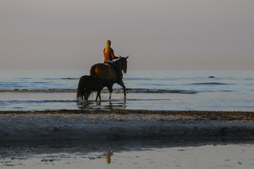Reiten am Strand
