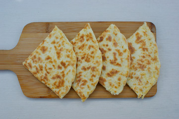 Georgian khachapuri imeruli. Georgian traditional food, hot khachapuri