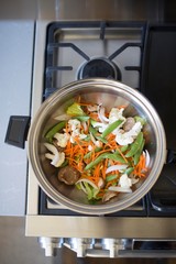 stir fried vegetables in a pan