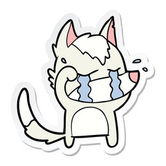 sticker of a cartoon crying wolf rubbing eyes
