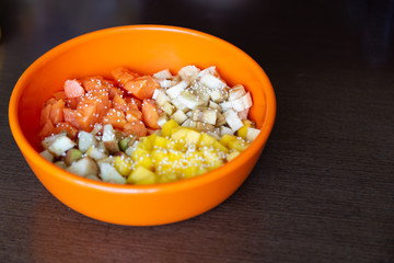 Orange dish with minced fruits