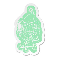 cartoon distressed sticker of a bored lion wearing santa hat