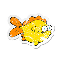 retro distressed sticker of a cartoon fish