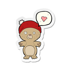 sticker of a cartoon bear in hat