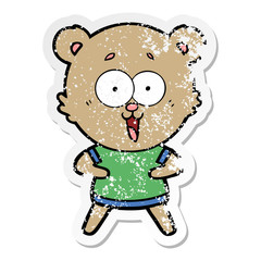 distressed sticker of a laughing teddy  bear cartoon
