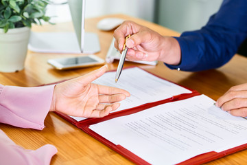 People signing contract