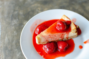 peice of cheese cake serve with strawberry syrub © amfroey01