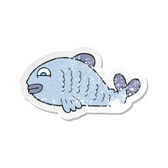 retro distressed sticker of a cartoon fish