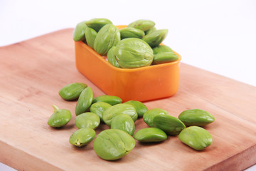 Parkia speciosa seeds or bitter bean on white background
