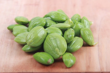 Parkia speciosa seeds or bitter bean on white background