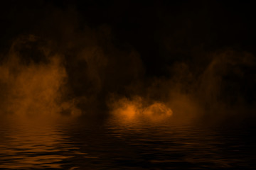 Fire smoke with reflection in water. Mistery fog texture background
