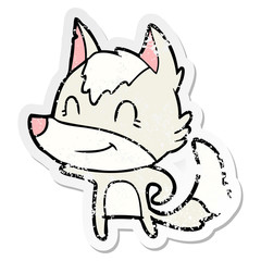 distressed sticker of a friendly cartoon wolf