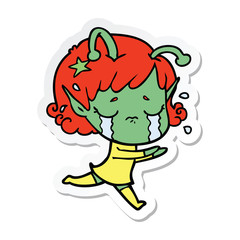 sticker of a cartoon crying alien girl