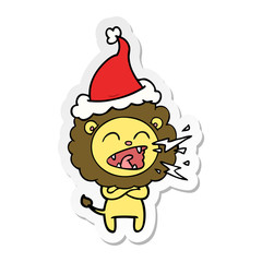 sticker cartoon of a roaring lion wearing santa hat