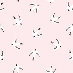 Beautiful seamless pattern with swallows. Vector illustration. Birds repeated background for baby fabric design.