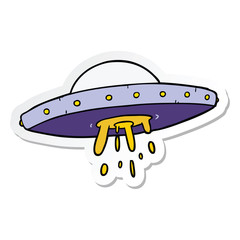 sticker of a cartoon flying UFO