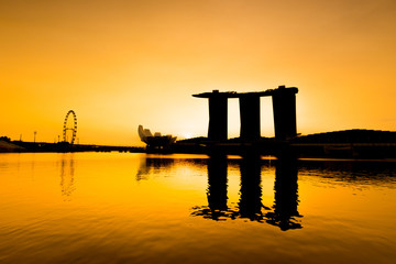 Naklejka premium View of business district and Marina bay skyline at sunrise in Singapore.