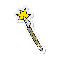 distressed sticker of a cartoon scalpel