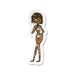 retro distressed sticker of a cartoon woman in bikini