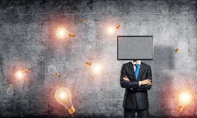 Businessman with TV instead of head.