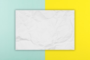 Hexagon brown paper on blue and yellow paper background. - space for your text