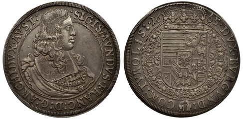 Holy Roman Empire of German Nation silver coin 1 one thaler 1665, bust of ruler of Tyrol Archduke Sigismund Franz in rich clothes, crowned shield with designs surrounded by order chain,