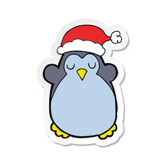 sticker of a cute christmas penguin