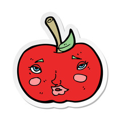 sticker of a cartoon apple with face