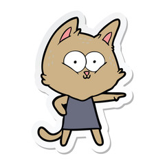 Obraz na płótnie Canvas sticker of a cartoon cat girl pointing