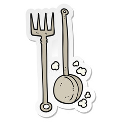 sticker of a cartoon old fireside tools