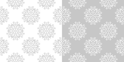 Floral seamless backgrounds. Gray and white compilation