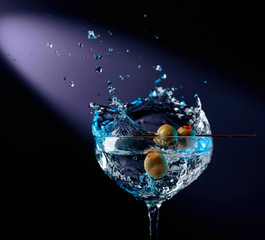 Martini with green olives.