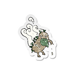 retro distressed sticker of a cartoon old potato