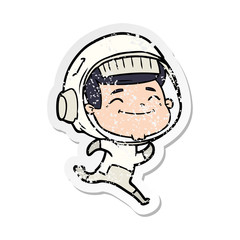distressed sticker of a happy cartoon astronaut