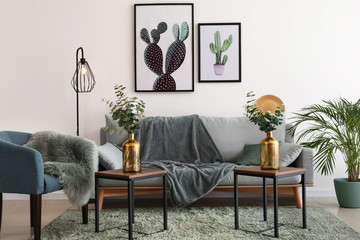 Modern interior of living room with stylish furniture