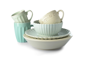 Set of clean dishes on white background