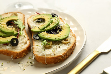Fresh tasty bruschettas on plate, closeup